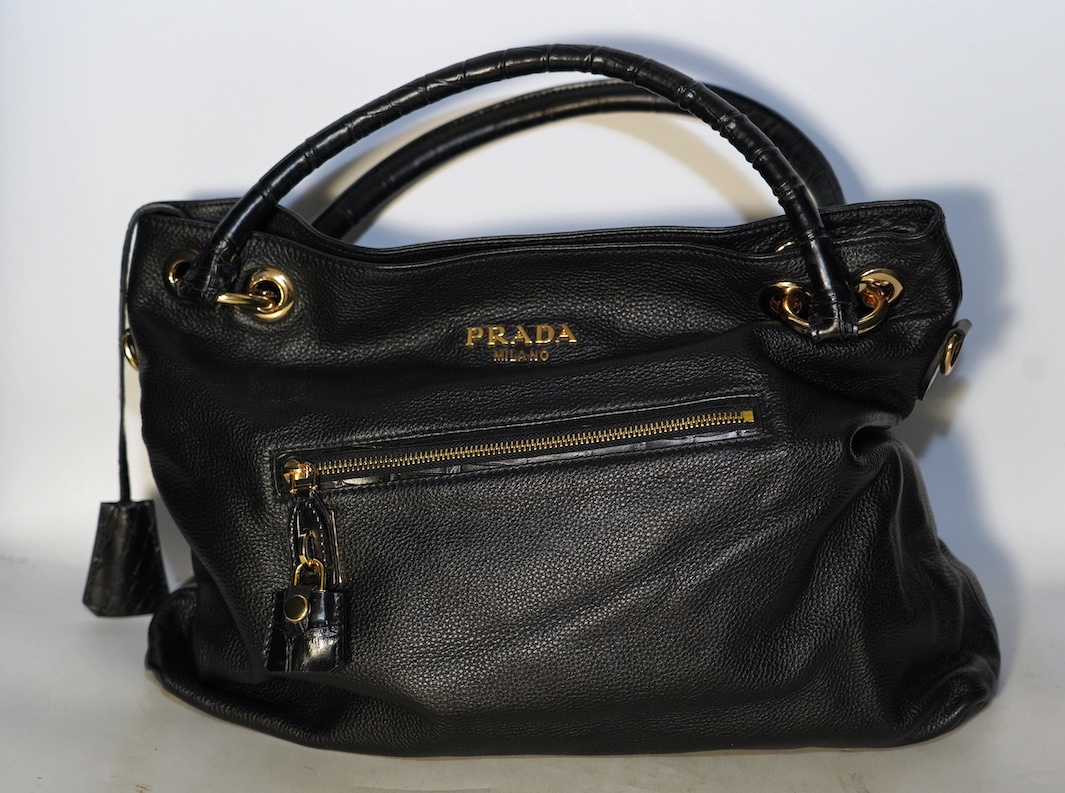 A black leather Prada handbag